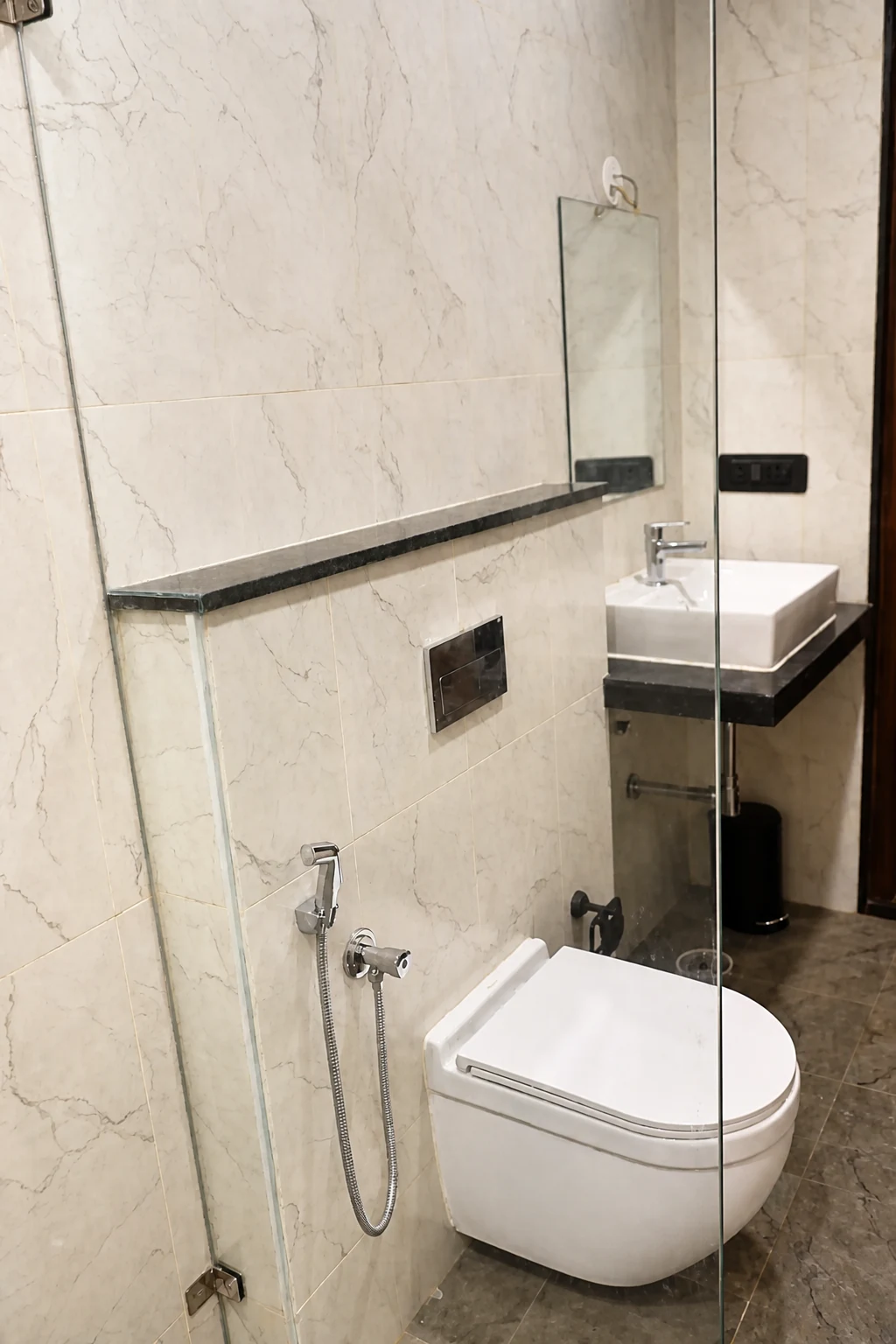 Glass shower and fixtures in the Loft Premium bathroom