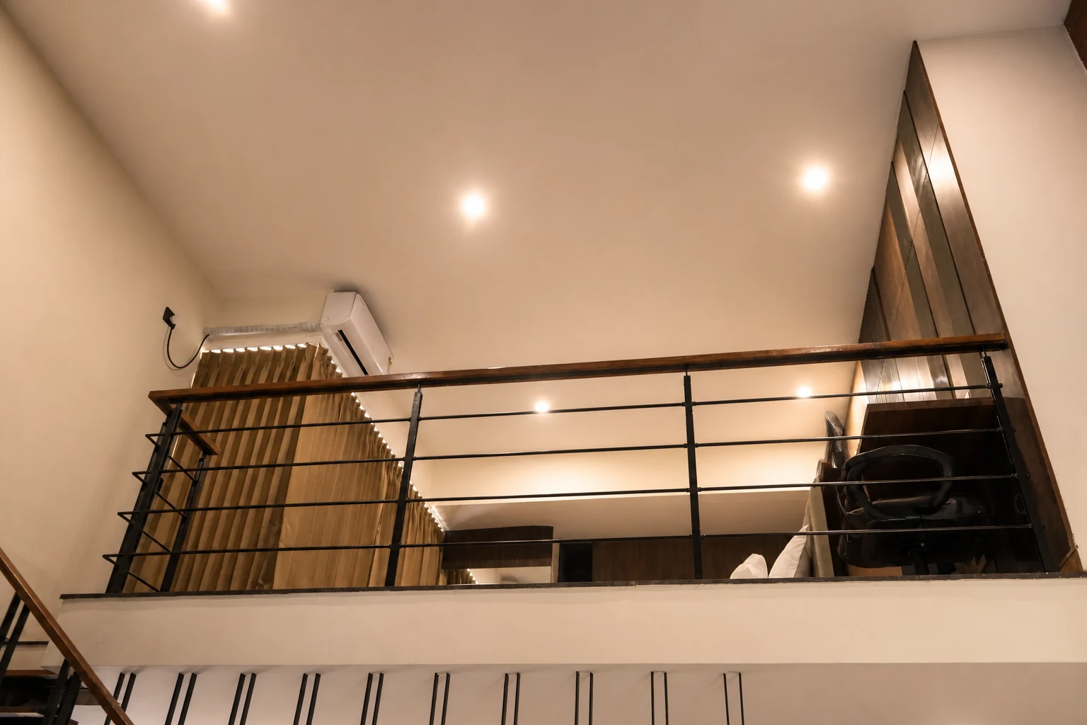 Mezzanine railing viewed from the Loft Premium lower floor