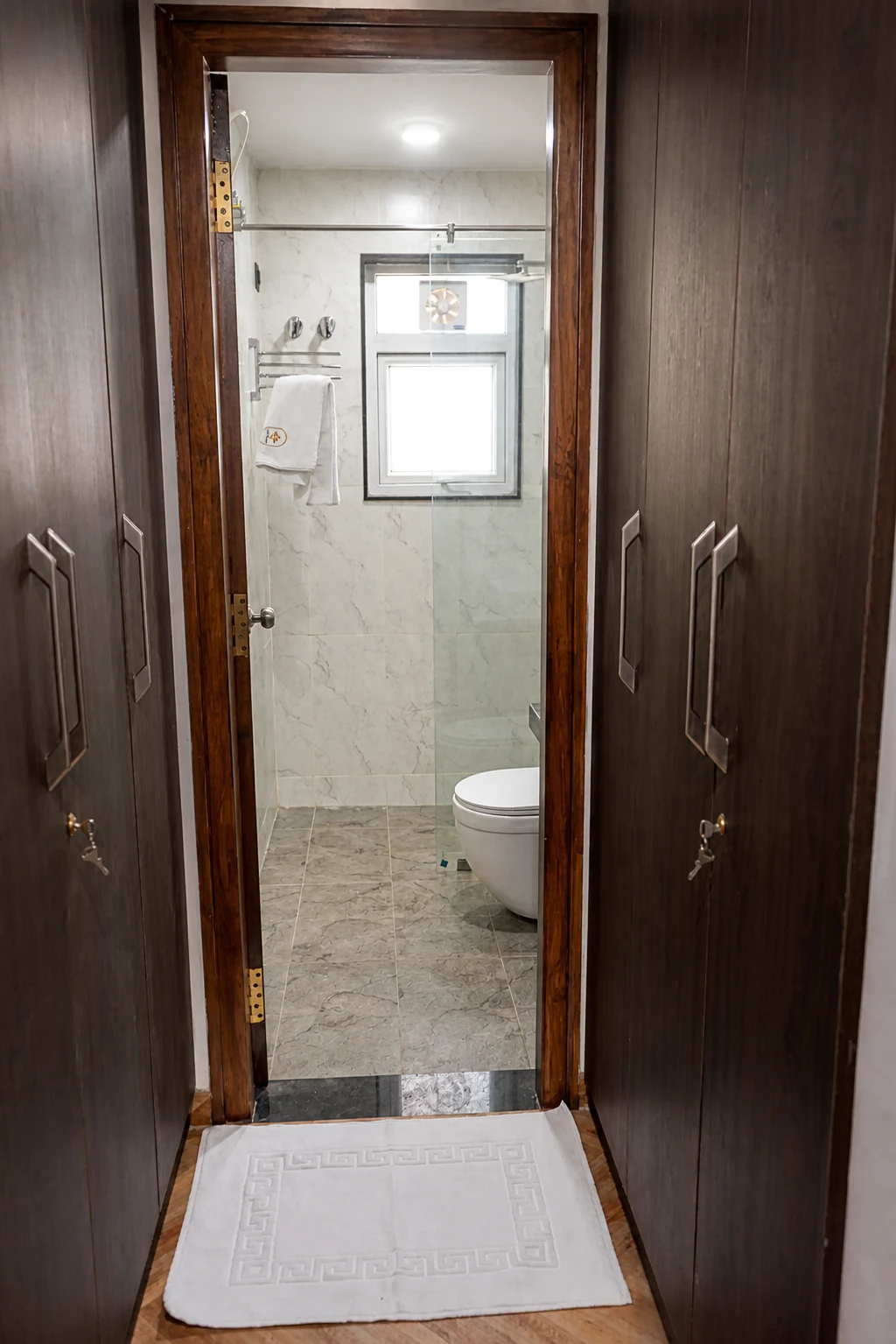 Bathroom viewed from the doorway in the 1BHK Premium apartment