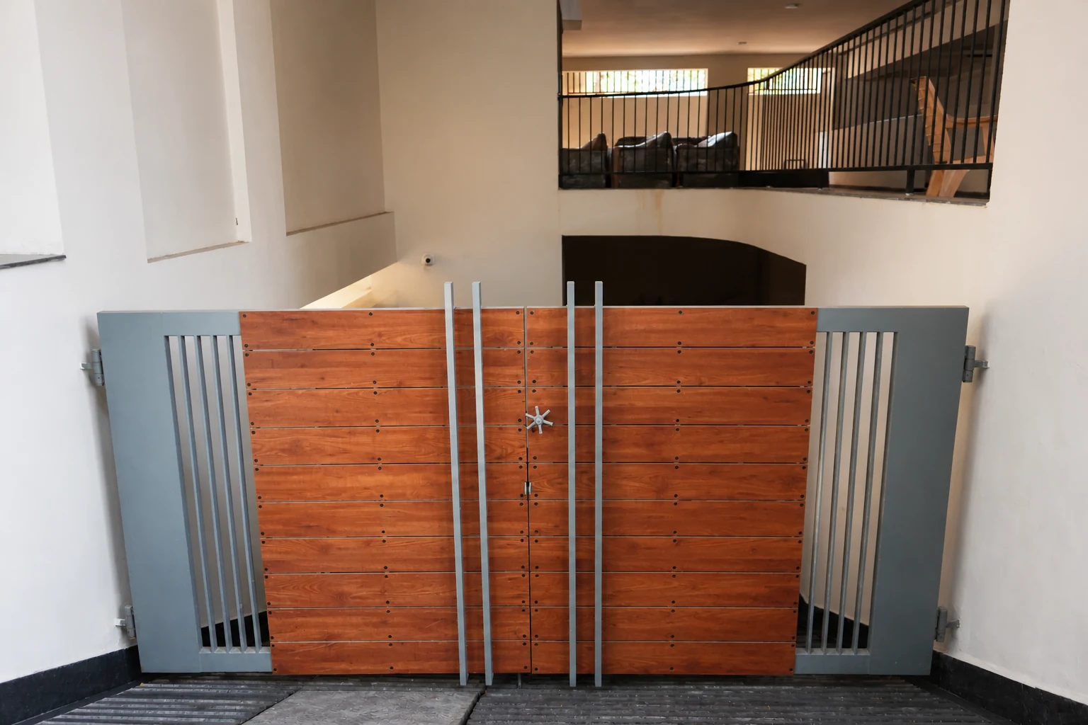Gate at the covered lower level of the LuxStayz residence